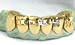 gold canine tooth